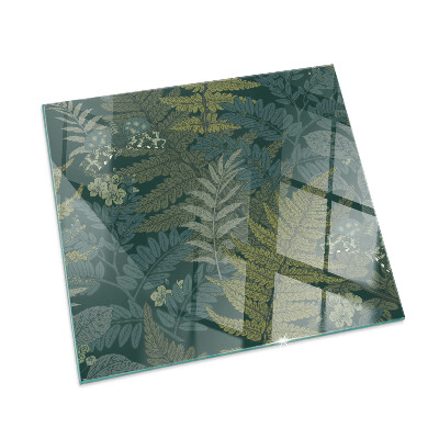 Kvadratisk glasskiva framför öppen spis Växtmotiv med fjärilar