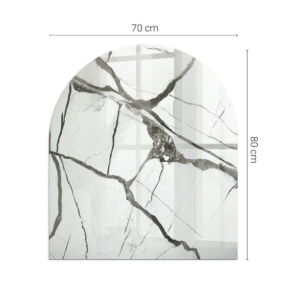 Halvoval glasskiva framför öppen spis Marmorådringar