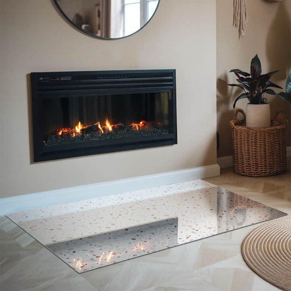 Rektangulär glasskiva framför öppen spis Mönster med små former