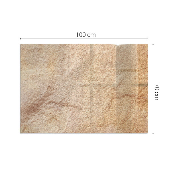 Rektangulär glasskiva framför öppen spis Struktur av natursten