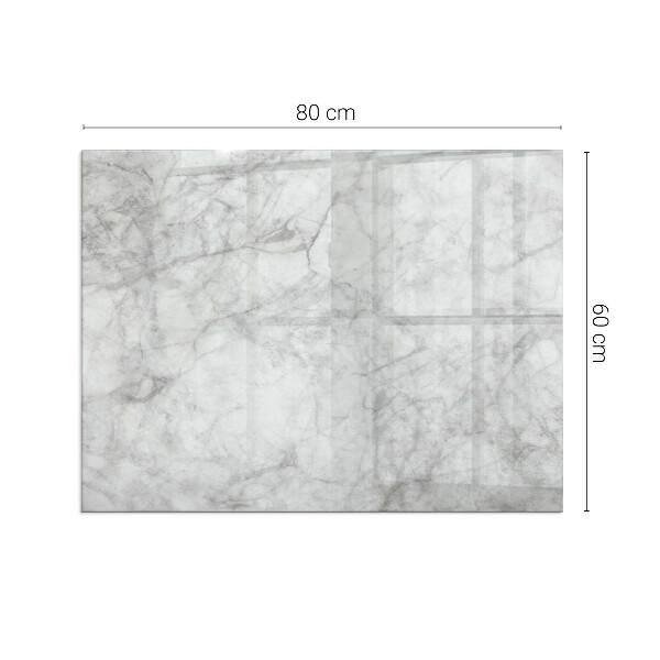 Rektangulär glasskiva framför öppen spis Marmormönster