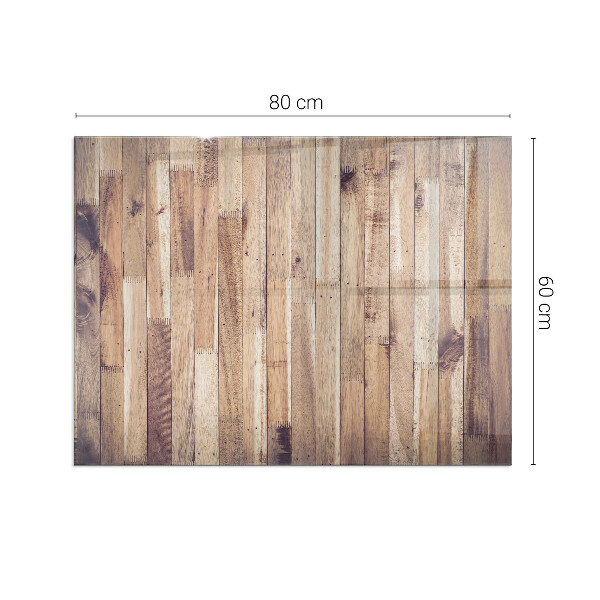 Rektangulär glasskiva framför öppen spis Träplank i mönster