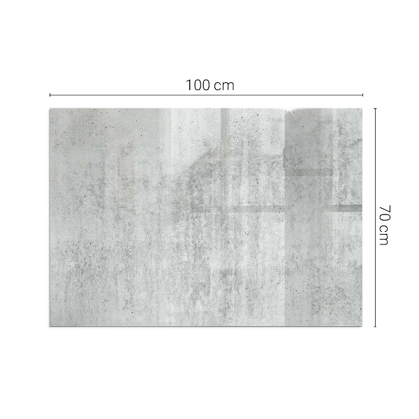 Rektangulär glasskiva under braskamin Rå betongstruktur