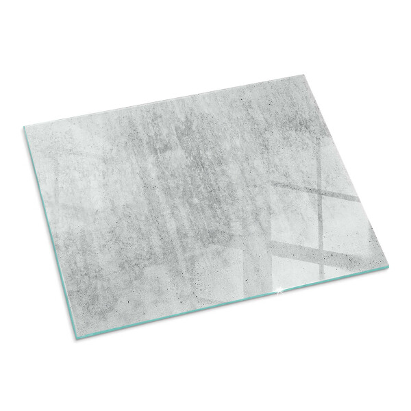 Rektangulär glasskiva under braskamin Rå betongstruktur