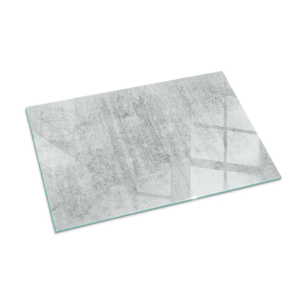 Rektangulär glasskiva under braskamin Rå betongstruktur