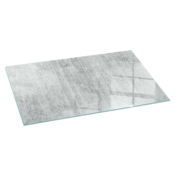 Rektangulär glasskiva under braskamin Rå betongstruktur