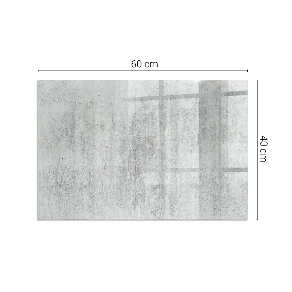 Rektangulär glasskiva under braskamin Rå betongstruktur