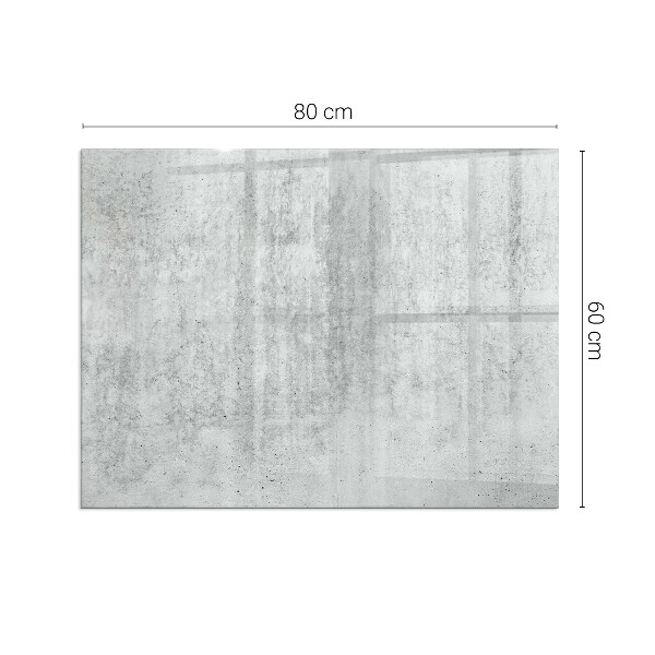 Rektangulär glasskiva under braskamin Rå betongstruktur