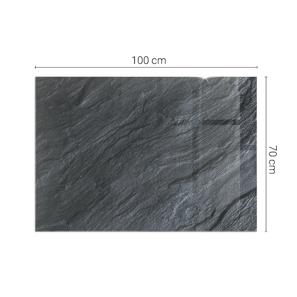 Rektangulär glasskiva under braskamin Stenytans struktur