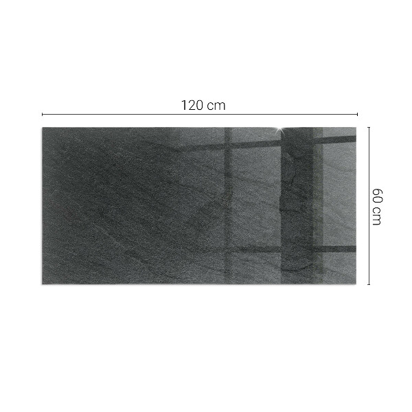 Rektangulär glasskiva framför öppen spis Stenytans struktur