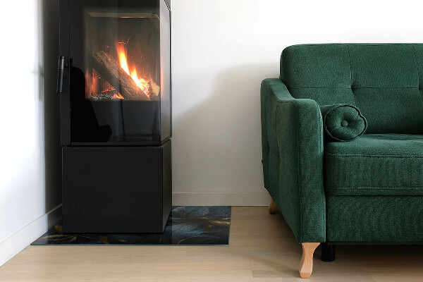 Rektangulär glasskiva under kamin Eleganta blad i textur