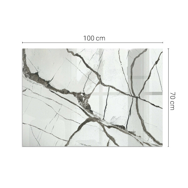 Rektangulär glasskiva framför öppen spis Marmorådringar