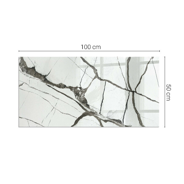 Rektangulär glasskiva framför öppen spis Marmorådringar