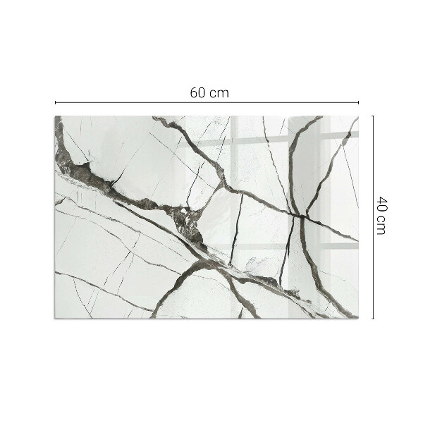 Rektangulär glasskiva framför öppen spis Marmorådringar