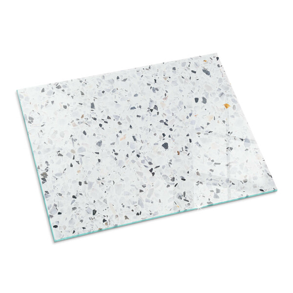 Rektangulär glasskiva under braskamin Stenmönster med små partiklar